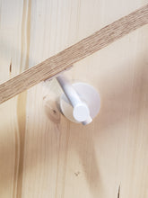 Load image into Gallery viewer, Modern handrail bracket, white color. attached to a custom wooden railing.
